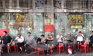 BANGKOK, THAILAND-NOVEMBER 23, 2016:Many peoples sit and eat street food in Chinatown, Bangkok Thailand.