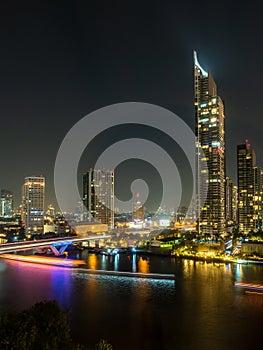 Night light scene skyscraper buildings citiscape view of Bangkok, Thailand