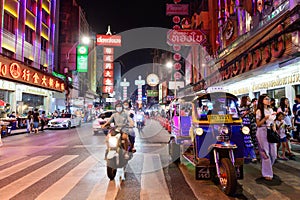 Bangkok, Thailand - November 22, 2020 : Tuk Tuk taxi wait tourists along the road at Chinatown