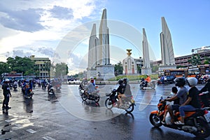 Motorbikes during rush hour in the busy streets around the Democracy Monument bangkok, Thailand