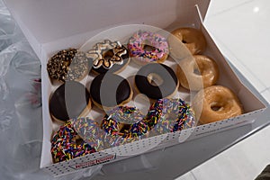 Bangkok, Thailand - October 10, 2020 : Close up of assorted Krispy Kreme donuts of colors in box
