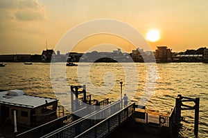 Bangkok, Thailand - October 14, 2016: Tha Maharaj boat pier in t photo