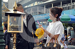 Bangkok, Thailand: People Lighting Incense