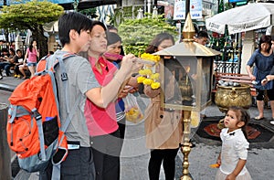 Bangkok, Thailand: People Lighting Incense