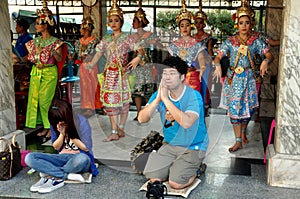 Bangkok, Thailand: People Praying at Erawan Shrine