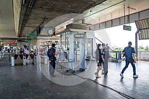 Bangkok, Thailand - 26 Sep 2020, Local Passenger pass the gate at Airport Rail Link, Ladkrabang Station with Security Guard checks