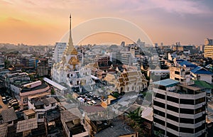 Bangkok, Thailand skyline at Temple of the Golden Buddha, Wat Traimit Temple, at sunset. Travel destination