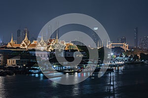 Bangkok Thailand - The Temple of the Emerald Buddha and the Chao Phraya river at night