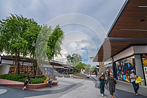 Unacquainted people shopping in Siam premium outlets