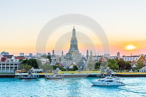 In Bangkok with Wat Arun temple at sunset