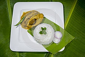 Bangla Cuisine Vorta, vaji, fish curry and vegetables curry platter.