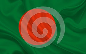 Bangladesh country flag on wavy silk fabric background panorama