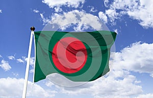 Bangladesh Flag Mockup, fluttering under a blue sky