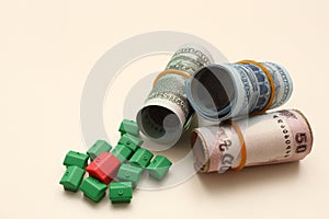 Bangladeshi currency or taka Roll and small toy house