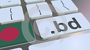 Bangladeshi domain .bd and flag of Bangladesh on the buttons on the computer keyboard. National internet related 3D