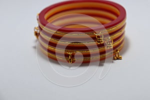 Bangle golden red colour gold jewellery new  design artifact on white background