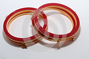 Bangle golden red colour gold jewellery new  design artifact on white background