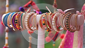 The bangles are made of glass, metal or lac and worn regularly or on special occasions by Indian women