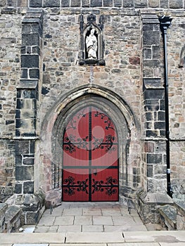 Bangor cathedral door with iron hinges and gothic design