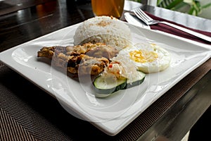 Bangsilog - Milk fish (bangus) served with garlic rice (sinangag), egg, and atchara