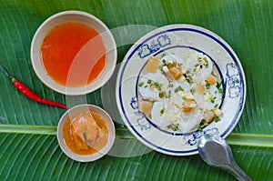 Banh Beo in Phan Thiet style. Banh Beo commonly calls Bloating Fern-shaped cake in English. It is kind of rice cake in small size