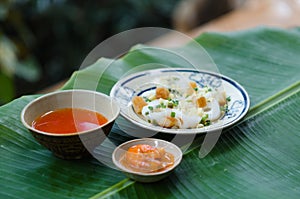 Banh Beo in Phan Thiet style. Banh Beo commonly calls Bloating Fern-shaped cake in English. It is kind of rice cake in small size