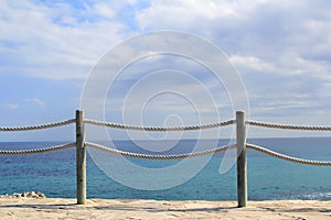 Banister railing on marine rope and wood