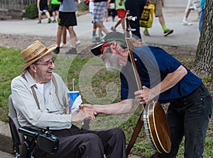 Banjo Player with Man in Wheelchair at Iowa State Fair