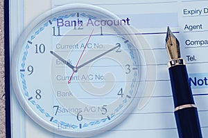 Bank account in book note with fountain pen