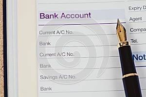 bank account in book note with fountain pen