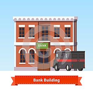 Bank building with armoured truck at the front