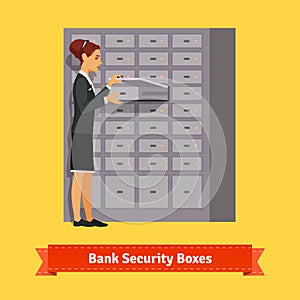 Bank clerk woman opening safe-deposit box