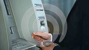 Bank client having problem with ATM, card got stuck in reader, equipment error