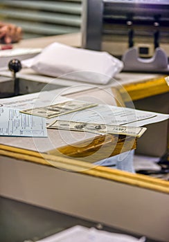 bank counter exchanging currency into dollar