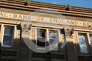 'Bank of England' inscribed on an old bank building