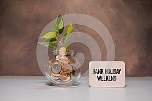 BANK HOLIDAY WEEKEND colorful background yellow, purple, blue text on white paper