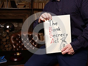 The Bank Secrecy Act BSA is shown on the conceptual photo using the text