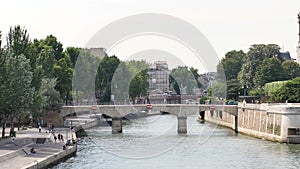 Bank of the seine near the cathedral in Paris, France.