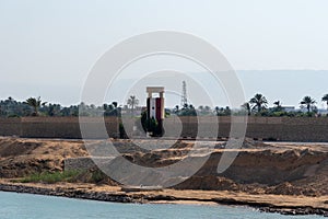 Bank of the Suez Canal, panorama view from transiting cargo ship.