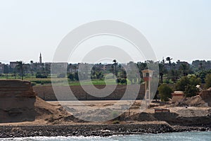 Bank of the Suez Canal, panorama view from transiting cargo ship.