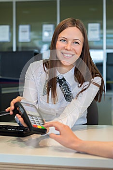 Bank worker offer to pay by credit card in bank