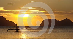 Banka, traditional filipino boat, at sunset in the Philippines