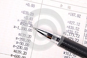 Bankbook and pen