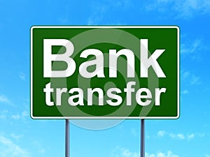 Banking concept: Bank Transfer on road sign background