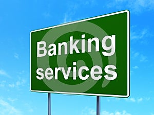 Banking concept: Banking Services on road sign background