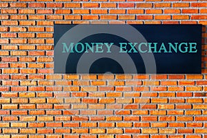 Banking concept: Money Exchange text on brick wall background