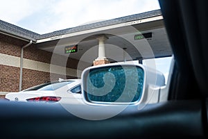 Banking Drive Thru Lanes shown from the Inside of an Automobile