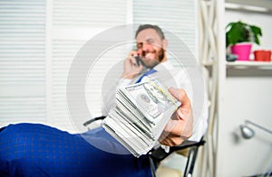 Banking support line concept. Man successful businessman phone conversation ask service. Businessman rich bearded guy