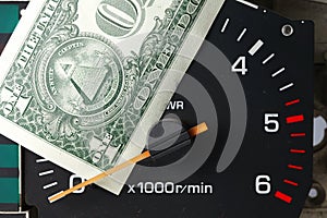 Banknote put tachometer gauge scene.