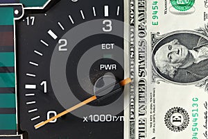 Banknote put tachometer gauge scene.